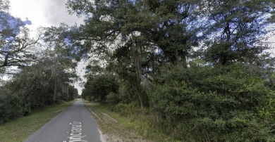 Build your forever home on this beautiful acre property on Indian Lake Estates Golf and Country Club in Florida - for sale on GolfHomes.com, golf home, golf lot