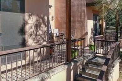 Southwest elegance meets resort living in this Santa Fe style on Alto Lakes Golf and Country Club in New Mexico - for sale on GolfHomes.com, golf home, golf lot