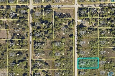 This spacious half-acre lot is located in the rapidly growing on Lehigh Resort Club in Florida - for sale on GolfHomes.com, golf home, golf lot