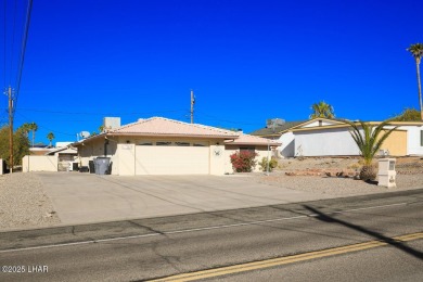 This 3-bedroom, 2-bath pool home is conveniently located in on London Bridge Golf Course in Arizona - for sale on GolfHomes.com, golf home, golf lot