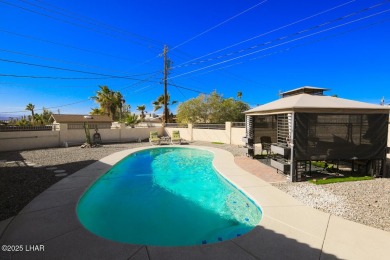 This 3-bedroom, 2-bath pool home is conveniently located in on London Bridge Golf Course in Arizona - for sale on GolfHomes.com, golf home, golf lot