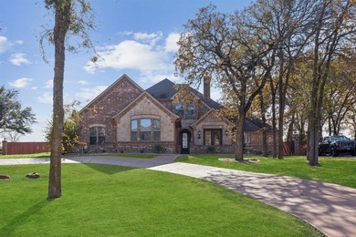 Welcome to this stunning, remodeled home located in the 24-7 on The Golf Club at Resort Eagle Mountain Lake in Texas - for sale on GolfHomes.com, golf home, golf lot