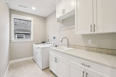 Refined living in the gated community of Two Creeks at Camas on Camas Meadows Golf Club in Washington - for sale on GolfHomes.com, golf home, golf lot