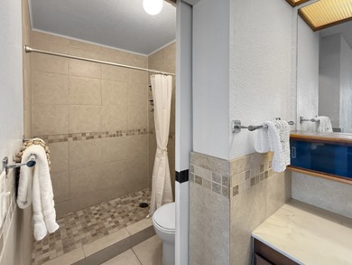 Country Club Villas 101 is an end condo with no stairs and the on Kona Country Club Golf Course in Hawaii - for sale on GolfHomes.com, golf home, golf lot