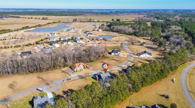 Welcome to the ''Boardwalk'' a beautifully designed one-level on Sound Golf Links at Albemarle Plantation in North Carolina - for sale on GolfHomes.com, golf home, golf lot