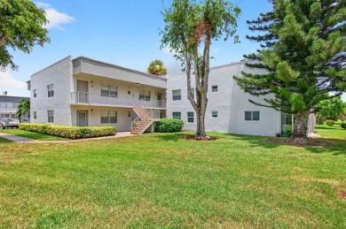 Check out this Ground-Floor Corner Unit with Fascinating Golf on Kings Point Golf -Flanders Way in Florida - for sale on GolfHomes.com, golf home, golf lot