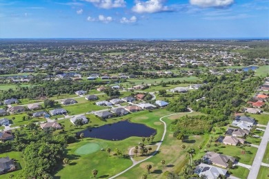 *** PRICE IMPROVEMENT***EXPANSIVE Water and Golf views set this on Rotonda Golf and Country Club - Long Marsh  in Florida - for sale on GolfHomes.com, golf home, golf lot