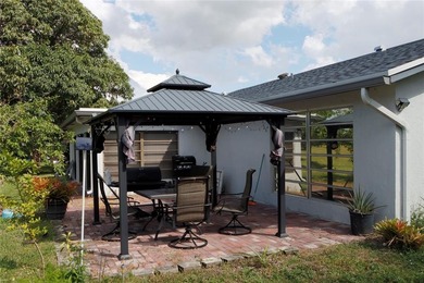 THE ONLY 600 MODEL WITH AN EXPANSIVE GOLF COURSE VIEW AND ADDED on Woodlands Country Club in Florida - for sale on GolfHomes.com, golf home, golf lot