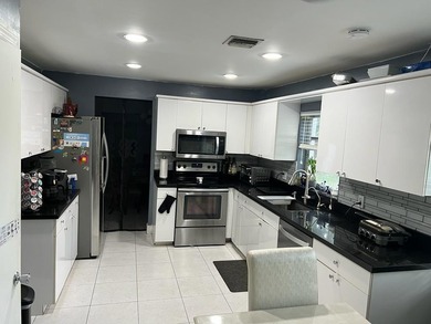 THE ONLY 600 MODEL WITH AN EXPANSIVE GOLF COURSE VIEW AND ADDED on Woodlands Country Club in Florida - for sale on GolfHomes.com, golf home, golf lot