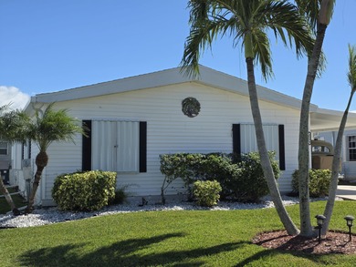 LAND OWNED 3-bedroom, 2 bath home located on a lake. Move -In on Savanna Golf Club in Florida - for sale on GolfHomes.com, golf home, golf lot