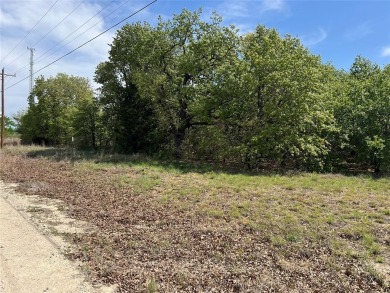 Beautiful building site in a progressively growing area. Cozy on Nocona Hills Golf Course in Texas - for sale on GolfHomes.com, golf home, golf lot
