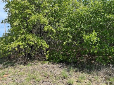 Beautiful building site in a progressively growing area. Cozy on Nocona Hills Golf Course in Texas - for sale on GolfHomes.com, golf home, golf lot