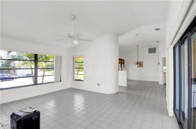 Gulf access pool home with 10,000 lb. boat lift, NO FLOODING! on Saint Andrews South Golf Club in Florida - for sale on GolfHomes.com, golf home, golf lot