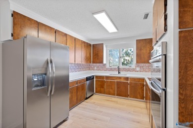 Stylish mid-century modern on a prime corner lot in vibrant on Point Mallard Golf Course in Alabama - for sale on GolfHomes.com, golf home, golf lot