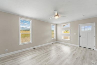 Experience modern country living with breathtaking mountain on Hollydot Golf Course in Colorado - for sale on GolfHomes.com, golf home, golf lot