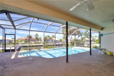 Gulf access pool home with 10,000 lb. boat lift, NO FLOODING! on Saint Andrews South Golf Club in Florida - for sale on GolfHomes.com, golf home, golf lot