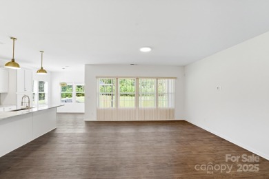 Discover the perfect family home at 224 Old Harbor Drive in on The Tillery Tradition Country Club in North Carolina - for sale on GolfHomes.com, golf home, golf lot