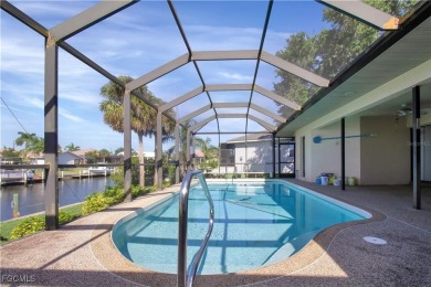 Gulf access pool home with 10,000 lb. boat lift, NO FLOODING! on Saint Andrews South Golf Club in Florida - for sale on GolfHomes.com, golf home, golf lot