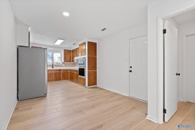 Stylish mid-century modern on a prime corner lot in vibrant on Point Mallard Golf Course in Alabama - for sale on GolfHomes.com, golf home, golf lot