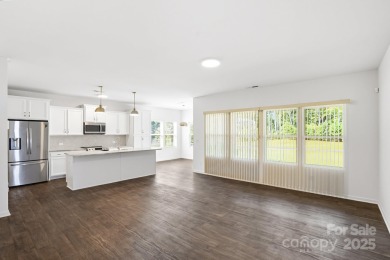 Discover the perfect family home at 224 Old Harbor Drive in on The Tillery Tradition Country Club in North Carolina - for sale on GolfHomes.com, golf home, golf lot