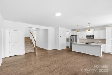 Discover the perfect family home at 224 Old Harbor Drive in on The Tillery Tradition Country Club in North Carolina - for sale on GolfHomes.com, golf home, golf lot