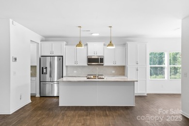 Discover the perfect family home at 224 Old Harbor Drive in on The Tillery Tradition Country Club in North Carolina - for sale on GolfHomes.com, golf home, golf lot