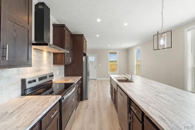 Experience modern country living with breathtaking mountain on Hollydot Golf Course in Colorado - for sale on GolfHomes.com, golf home, golf lot