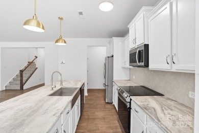 Discover the perfect family home at 224 Old Harbor Drive in on The Tillery Tradition Country Club in North Carolina - for sale on GolfHomes.com, golf home, golf lot