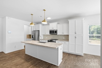 Discover the perfect family home at 224 Old Harbor Drive in on The Tillery Tradition Country Club in North Carolina - for sale on GolfHomes.com, golf home, golf lot