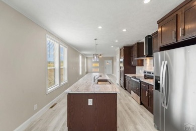 Experience modern country living with breathtaking mountain on Hollydot Golf Course in Colorado - for sale on GolfHomes.com, golf home, golf lot