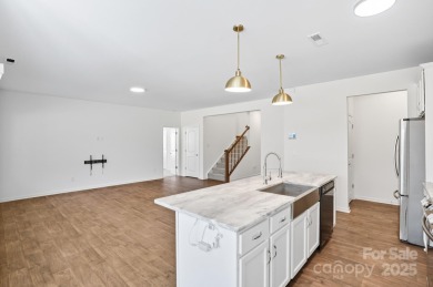 Discover the perfect family home at 224 Old Harbor Drive in on The Tillery Tradition Country Club in North Carolina - for sale on GolfHomes.com, golf home, golf lot