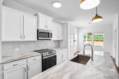 Discover the perfect family home at 224 Old Harbor Drive in on The Tillery Tradition Country Club in North Carolina - for sale on GolfHomes.com, golf home, golf lot