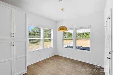 Discover the perfect family home at 224 Old Harbor Drive in on The Tillery Tradition Country Club in North Carolina - for sale on GolfHomes.com, golf home, golf lot