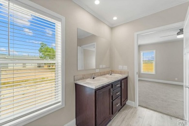 Experience modern country living with breathtaking mountain on Hollydot Golf Course in Colorado - for sale on GolfHomes.com, golf home, golf lot