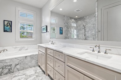 259 Moonlit Way is an exceptional Southerninspired residence on Regatta Bay Golf and Country Club in Florida - for sale on GolfHomes.com, golf home, golf lot