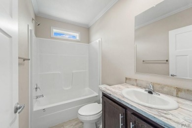Experience modern country living with breathtaking mountain on Hollydot Golf Course in Colorado - for sale on GolfHomes.com, golf home, golf lot