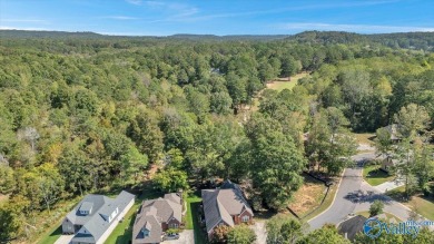 Located just 18 minutes from Huntsville, discover your dream on Cherokee Ridge Country Club in Alabama - for sale on GolfHomes.com, golf home, golf lot