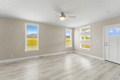 Experience modern country living with breathtaking mountain on Hollydot Golf Course in Colorado - for sale on GolfHomes.com, golf home, golf lot