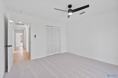 Stylish mid-century modern on a prime corner lot in vibrant on Point Mallard Golf Course in Alabama - for sale on GolfHomes.com, golf home, golf lot