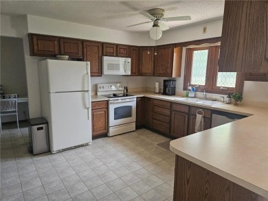 Step into this charming 2-bedroom, 2 bathroom townhouse, where on Wedgewood Cove Golf Club in Minnesota - for sale on GolfHomes.com, golf home, golf lot
