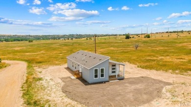 Experience modern country living with breathtaking mountain on Hollydot Golf Course in Colorado - for sale on GolfHomes.com, golf home, golf lot