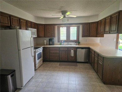 Step into this charming 2-bedroom, 2 bathroom townhouse, where on Wedgewood Cove Golf Club in Minnesota - for sale on GolfHomes.com, golf home, golf lot