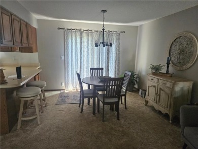 Step into this charming 2-bedroom, 2 bathroom townhouse, where on Wedgewood Cove Golf Club in Minnesota - for sale on GolfHomes.com, golf home, golf lot