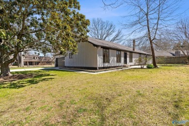 Stylish mid-century modern on a prime corner lot in vibrant on Point Mallard Golf Course in Alabama - for sale on GolfHomes.com, golf home, golf lot
