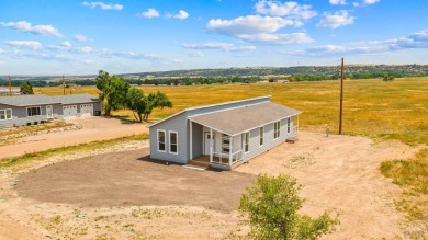 Experience modern country living with breathtaking mountain on Hollydot Golf Course in Colorado - for sale on GolfHomes.com, golf home, golf lot