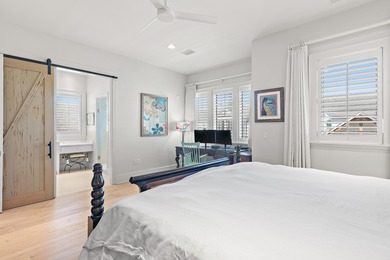 259 Moonlit Way is an exceptional Southerninspired residence on Regatta Bay Golf and Country Club in Florida - for sale on GolfHomes.com, golf home, golf lot