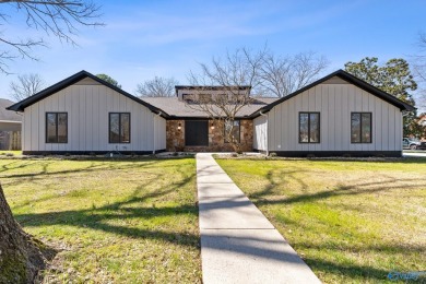 Stylish mid-century modern on a prime corner lot in vibrant on Point Mallard Golf Course in Alabama - for sale on GolfHomes.com, golf home, golf lot