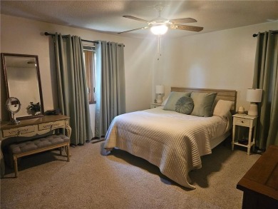 Step into this charming 2-bedroom, 2 bathroom townhouse, where on Wedgewood Cove Golf Club in Minnesota - for sale on GolfHomes.com, golf home, golf lot