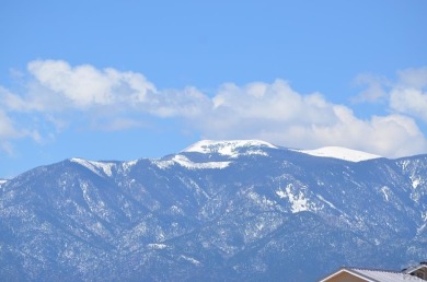 Experience modern country living with breathtaking mountain on Hollydot Golf Course in Colorado - for sale on GolfHomes.com, golf home, golf lot