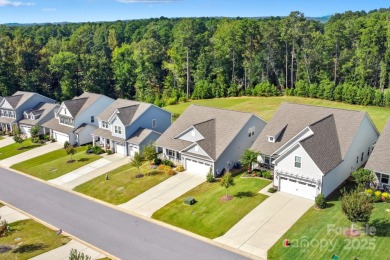 Discover the perfect family home at 224 Old Harbor Drive in on The Tillery Tradition Country Club in North Carolina - for sale on GolfHomes.com, golf home, golf lot